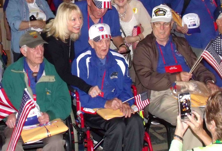 Crowd cheers return of year’s first  Villages Honor Flight mission