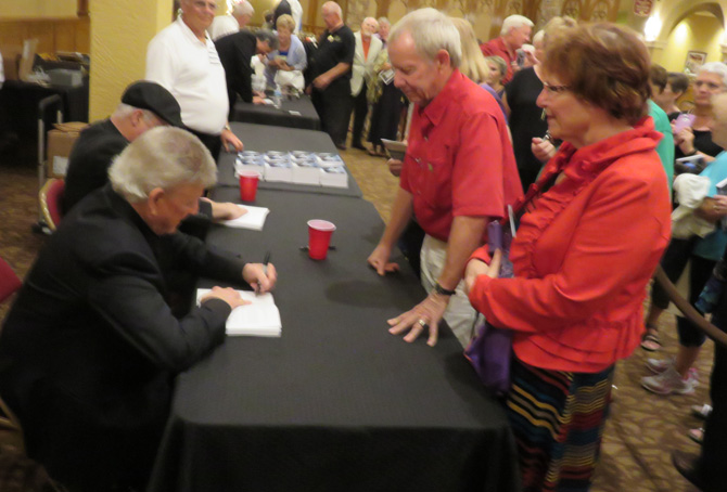 Bobby Rydell autographs his newlly-released biography for Villagers Barry and Lorraine Laidlaw