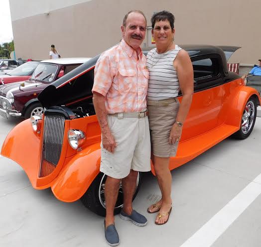 Vintage vehicles on display at opening of new business on CR 466