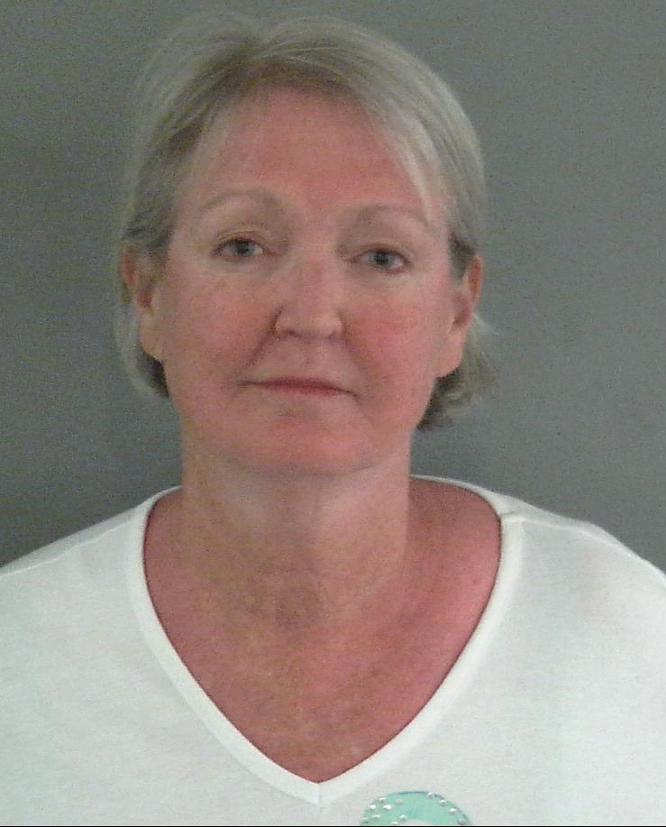 Villager who said she drank wine at community pool arrested after wild ride in golf cart