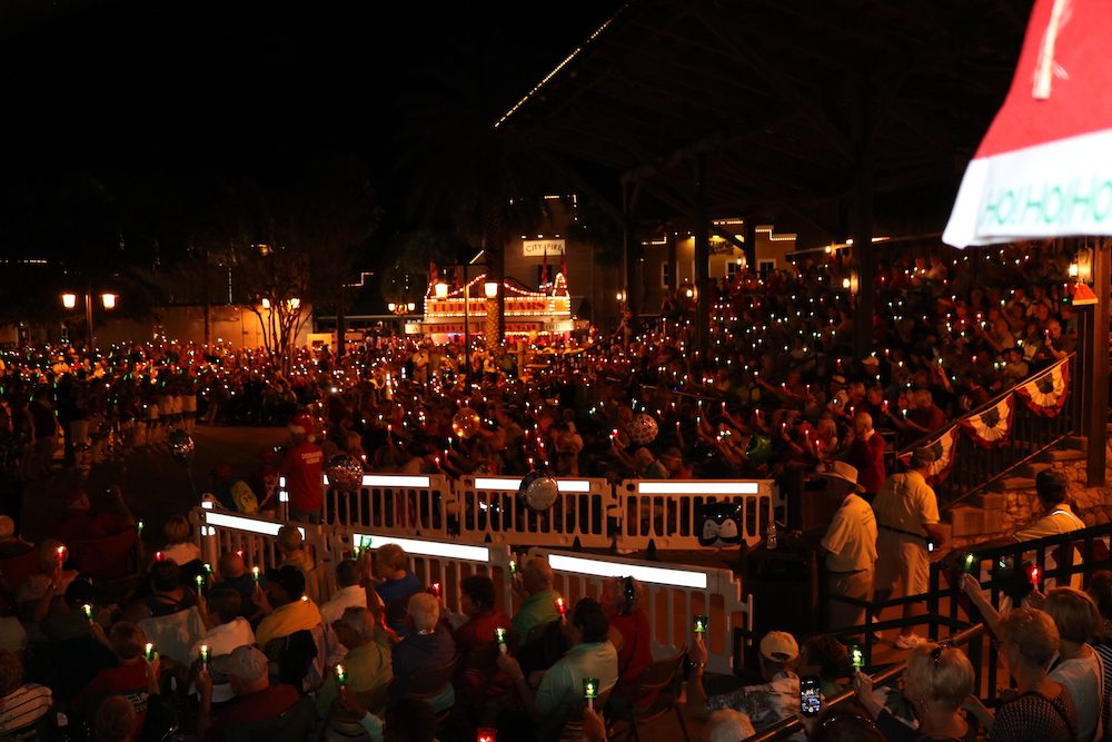 Villagers in stands at Brownwood for Tree-Lighting Ceremony