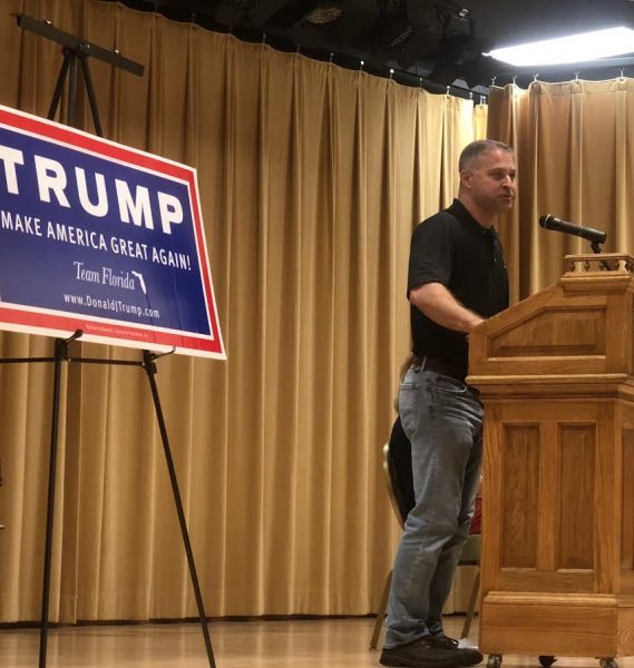 Brett Hage tells the packed audience his interest in the vacant District 33 seat.