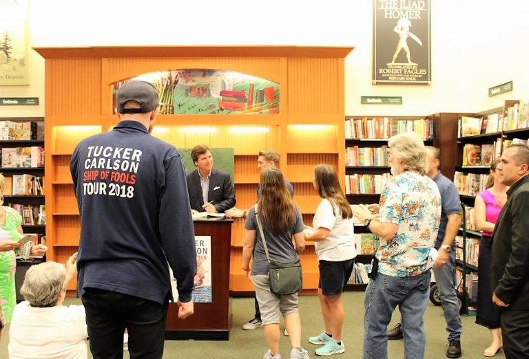 Fox News personality Tucker Carlson draws passionate fans to book-signing event