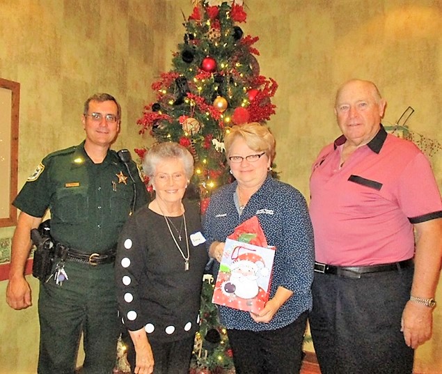 Villages neighborhood comes together to support Kids, Cops and Christmas