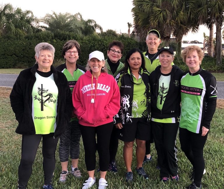 Villages Dragon Sister coaching teammates in pursuit of finish line at Disney half-marathon