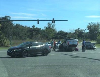 Two hurt as vehicle flips over in crash at busy Leesburg intersection