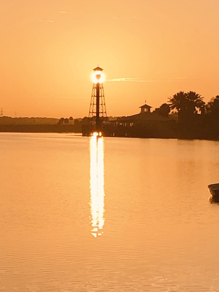 Sun Behind Lake Sumter Landing Lighthouse