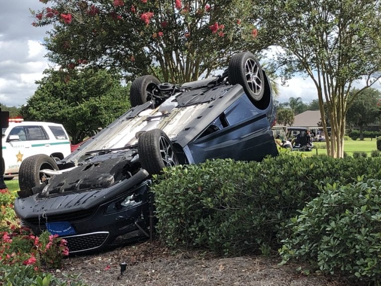Driver injured when vehicle flips in roundabout in The Villages