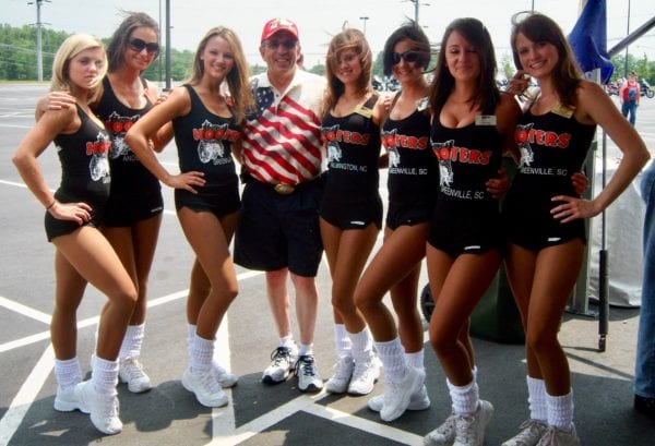 Earl Knight had this photo taken of him with women from Hooters