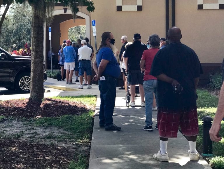 Eager early voters line up to cast ballots in and around The Villages