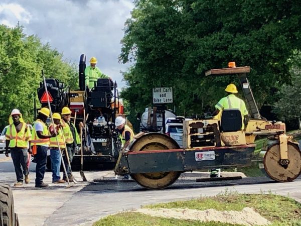 A paving crew at work at Villa De La Vista South