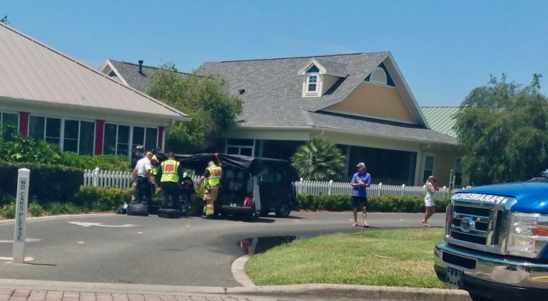 Golf carts in head-on collision on path at Lake Sumter Landing