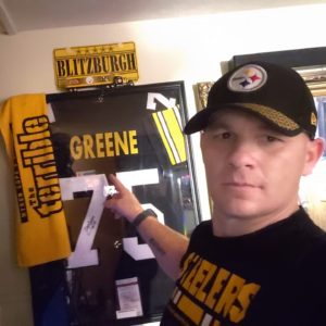 Jacob Moore Louden with Pittsburgh Steelers memorabilia