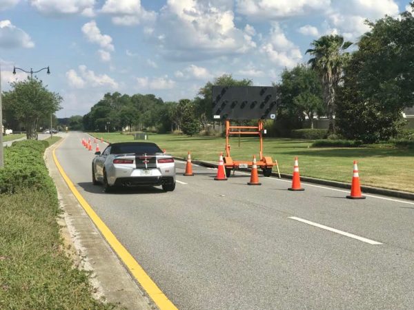 Orange cones have been set up on County Road 466 in anticipation of the lane closure