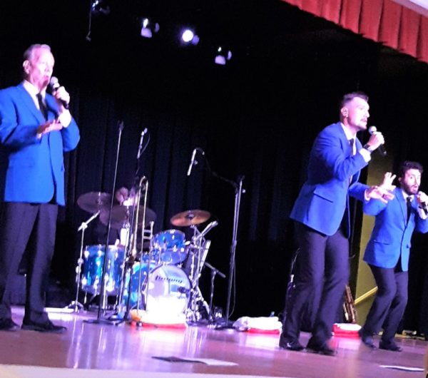 The Diamonds on stage entertaining the Paisans Club. From left Gary Owens Michael Lawrence and Adam Marino