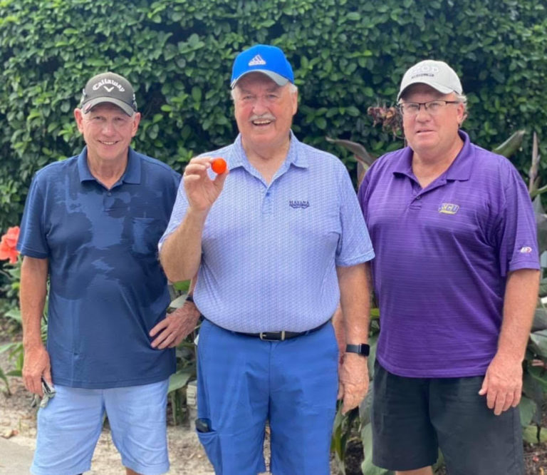 Gary Grigg center was golfing with the 1812 Golf Club when he got his second hole in one