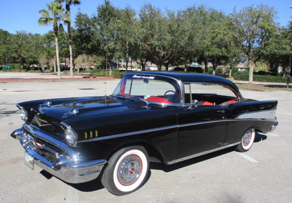 The 1957 Chevrolet 2 door owned by Brian Doyle. Owners sometimes paint their wheel rims red to enhance the appearance of the car The 1957 Chevrolet 2 door owned by Brian Doyle. Owners sometimes paint their wheel rims red to enhance the appearance of the car
