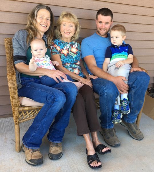 Three generations of Ann Marie Acacios family L R daughter Suzanne holding Jase Ann Marie and Suzannes husband Josh with Avianna.