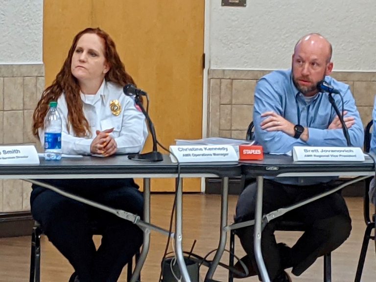 Christine Kennedy local operations head for American Medical Response in Sumter County and Brett Jovanich AMR regional vice president listen to questions from committee members.