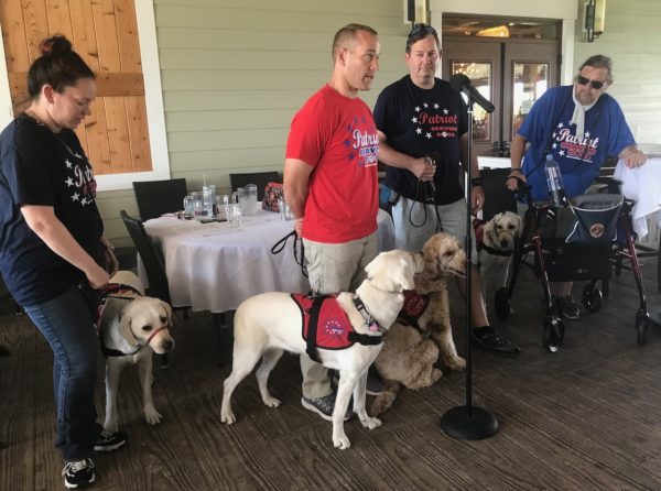 The four recipients of Patriot Service dogs on Saturday July 17 L R Kristy with Charlie Matt with Molly Jim with Major and Chuck with Dakota.