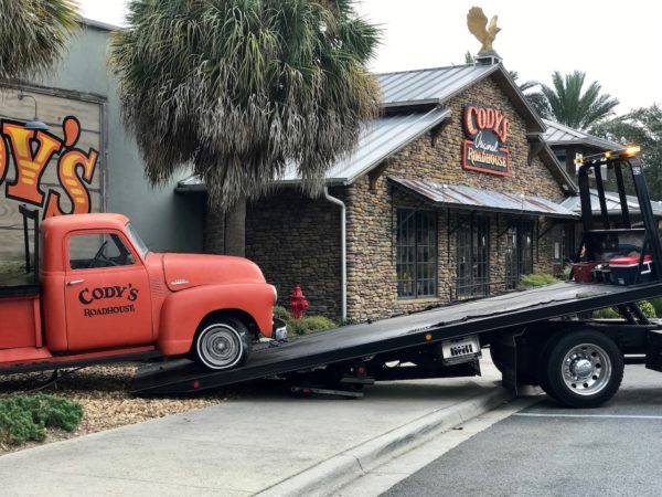 The pickup truck was towed away Wednesday morning from Codys Original Roadhouse