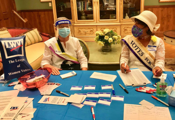 Jeanie Hamilton left and Mary Schulz staffed the registration desk. All participants were careful to wear masks during the event. Jeanie Hamilton left and Mary Schulz staffed the registration desk. All participants were careful to wear masks during the event.
