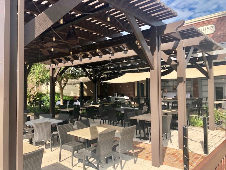 Outdoor seating is offered at the Chop House at Lake Sumter Landing 1