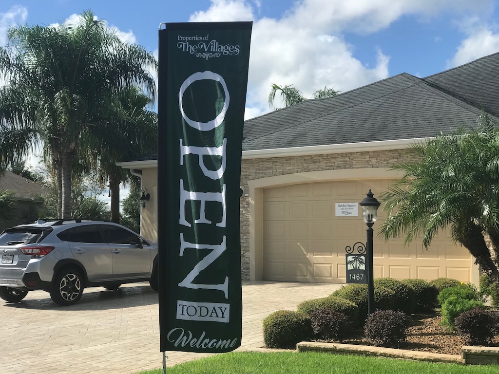 This feather banner was put up by Properties of The Villages