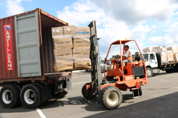 RoMac provided the forklift and operator to help load the container as well as a truck to move supplies to the container.