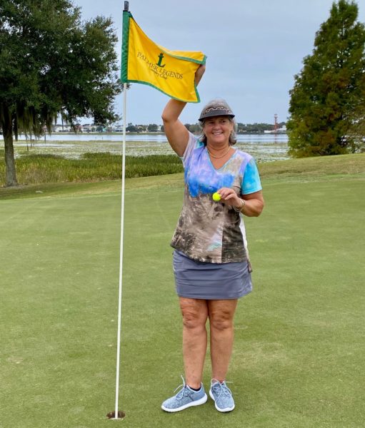 Patti Varn celebrates after getting a hole in one