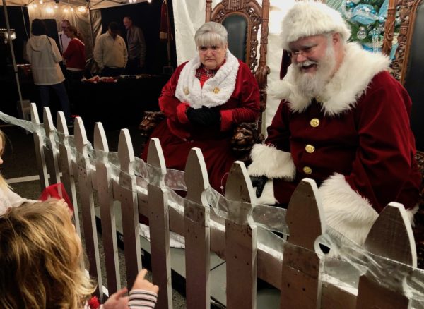 Santa Claus was taking childrens requests Saturday night at Lake Sumter Landing Santa Claus was taking childrens requests Saturday night at Lake Sumter Landing