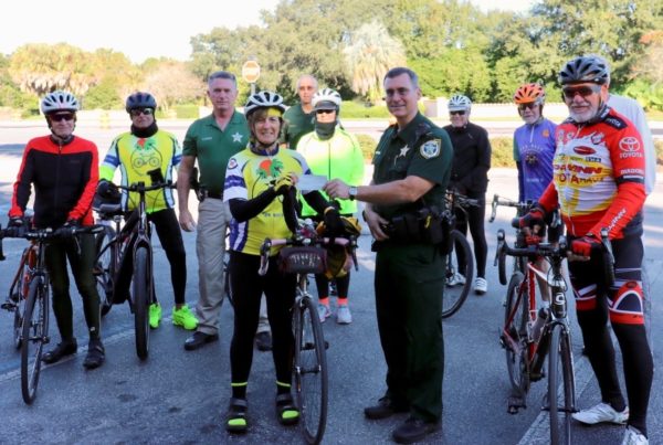 The Village Bicycle Club delivered a donation Tuesday to the sheriffs office for its bicycle program