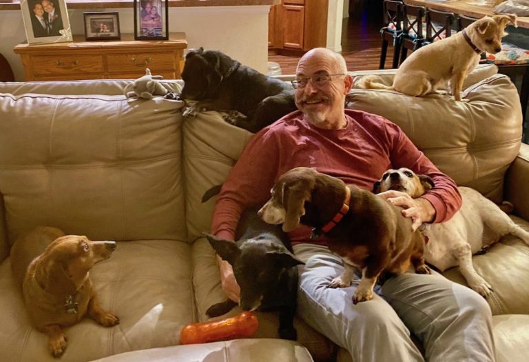 Rabbi Zev Sonnenstein with his six dogs