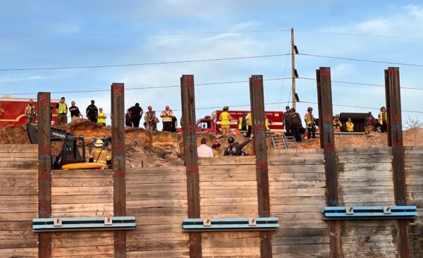 Emergency personnel were stationed at the bridge at U.S. Hwy. 27441 where the worker was trapped Emergency personnel were stationed at the bridge at U.S. Hwy. 27441 where the worker was trapped