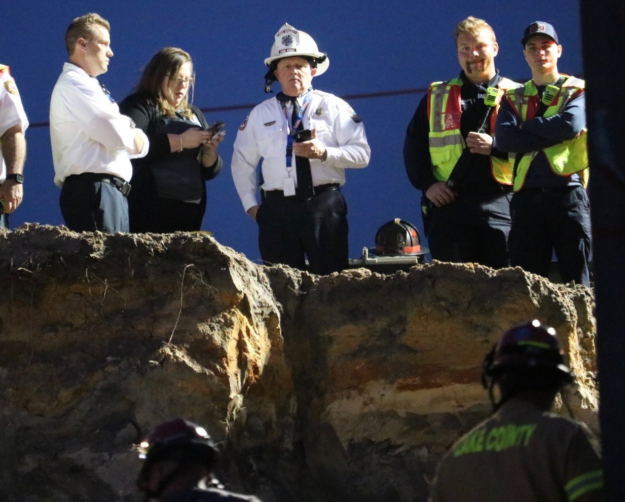 Emergency personnel worked into the night at the site at the bridge at U.S. Hwy. 27441