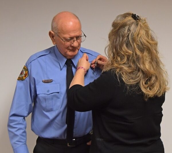 New fire inspector John Castell was pinned by his daughter Laurie New fire inspector John Castell was pinned by his daughter Laurie