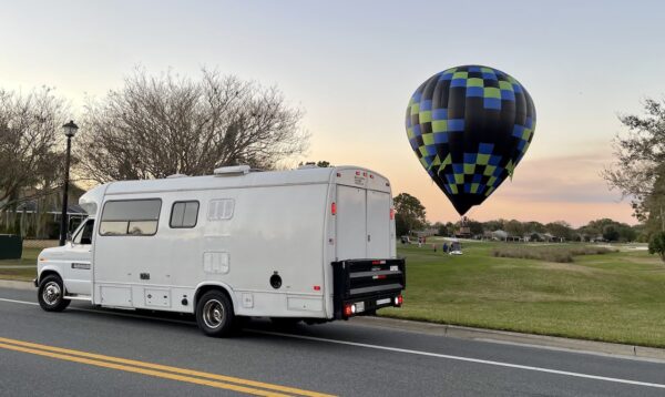 The chase vehicle caught up to the hot air balloon