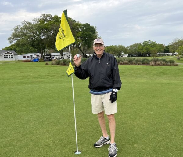 Villager Dick Montroy was thrilled to get his second hole in one