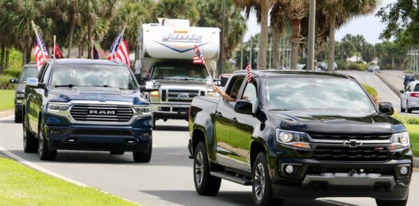 Flags were flying from the vehicles which rolled through The Villages