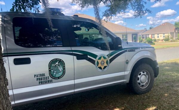 An investigator from the Florida Fish Wildlife Conservation Commission was at the pond Wednesday afternoon in The Villages