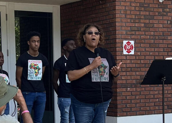 Cozette Sessler encouraged those attending the vigil to speak up and declare 22Enough is enough.22 Cozette Sessler encouraged those attending the vigil to speak up and declare 22Enough is enough.22