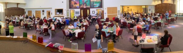 Numerous tables accommodate mahjongg players at Temple Shalom