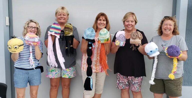 Residents of the Village of DeSoto decorated beanies for children who have lost their hair