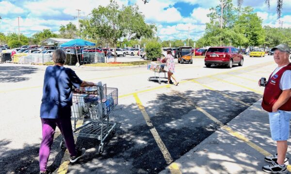Shoppers at BJs Wholesale Club returned to their vehicles parked at the nearby Lowes