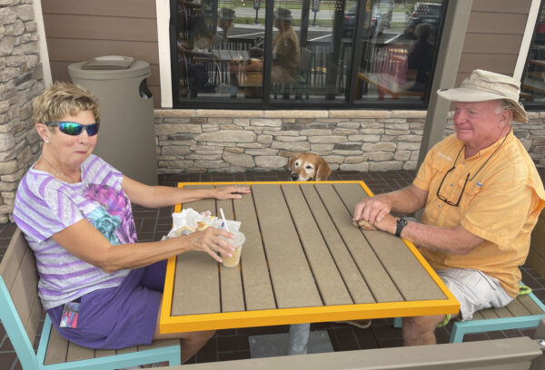 Kathy and Timothy McDaniel visited McDonalds with their dog Mango