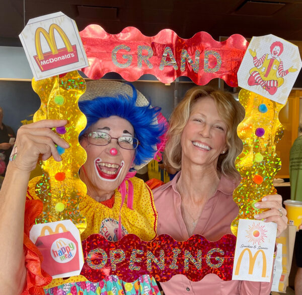 OwnerOperator Rebecca Babalian celebrating the Grand Opening with Cupcake the Clown from Clown Alley 179