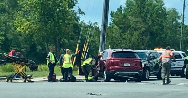 The maroon Lincoln sustained a broken axel in the crash at Rolling Acres Road and County Road 466.