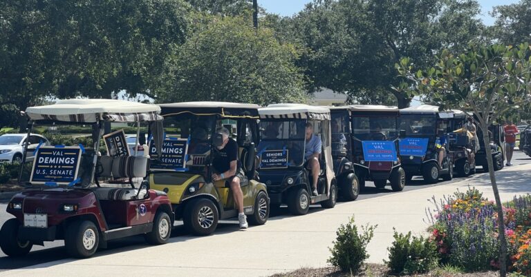 Villagers in golf carts lined up to support U.S. Senate candidate Val Demings.