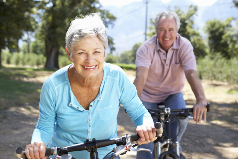 older couple on E bikes