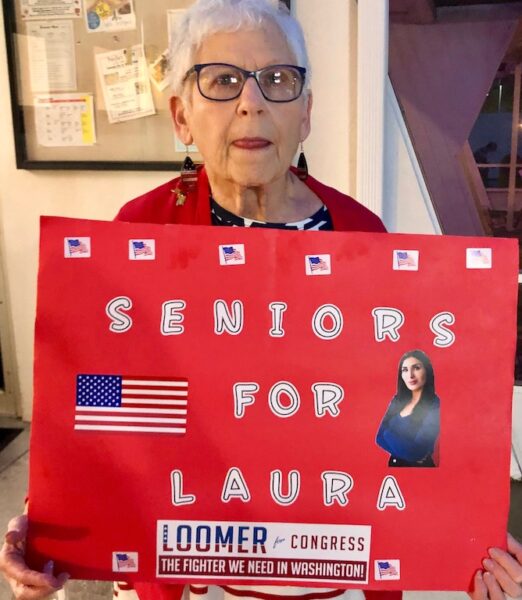 Rita Gallin held a sign for Laura Loomer all day on Election Day at her polling station